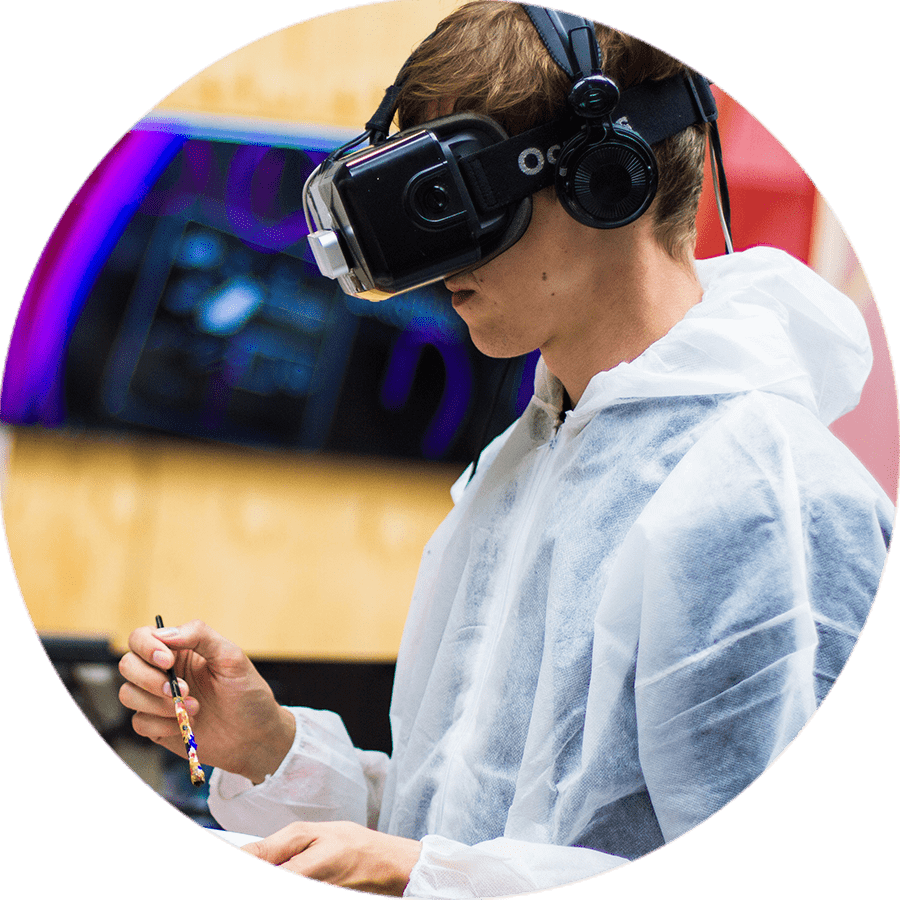 a student wearing VR goggles