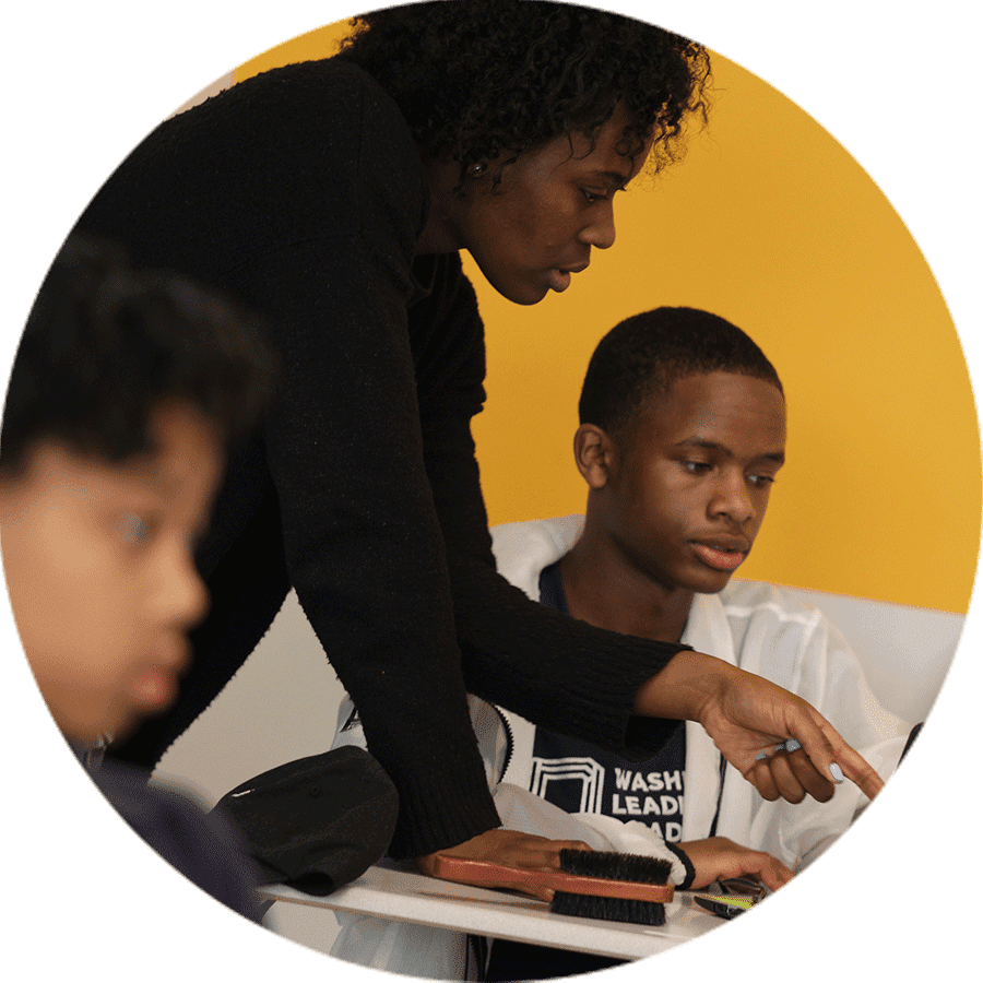 a teacher and students woorking