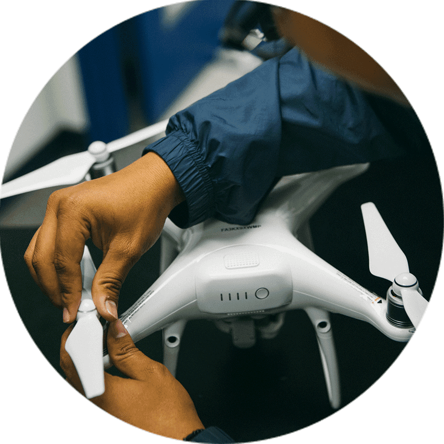 student preparing a drone