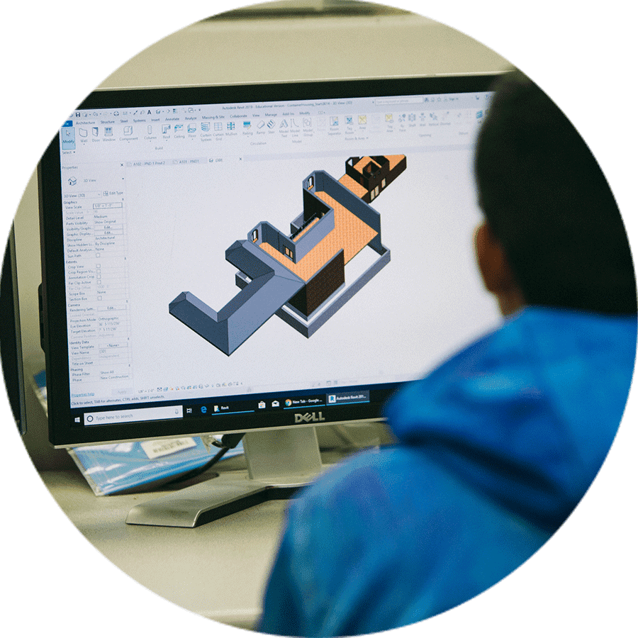 a student working on a floor plan on a computer