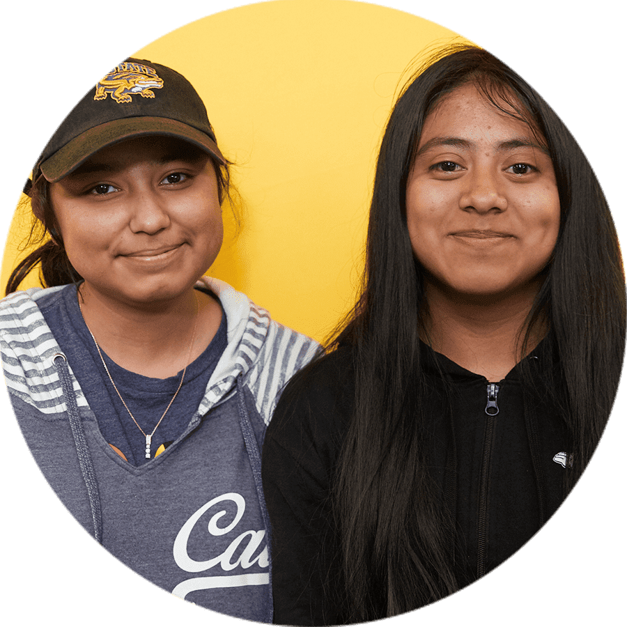 two students smiling